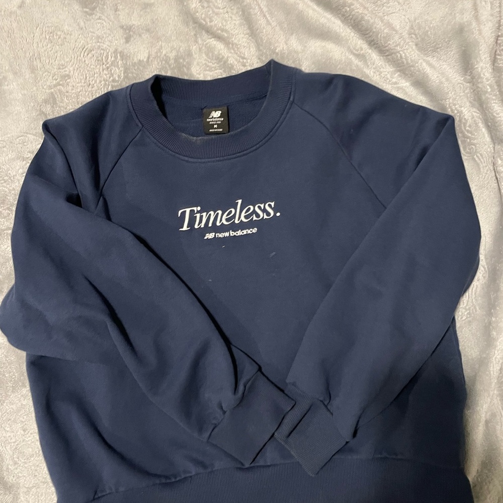New Balance womens Timeless Blue Crewneck Sweater